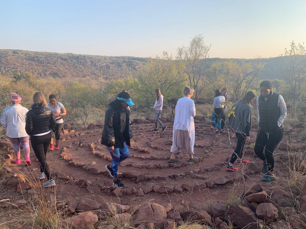 Retreat participants gathering in sacred circle for ceremony